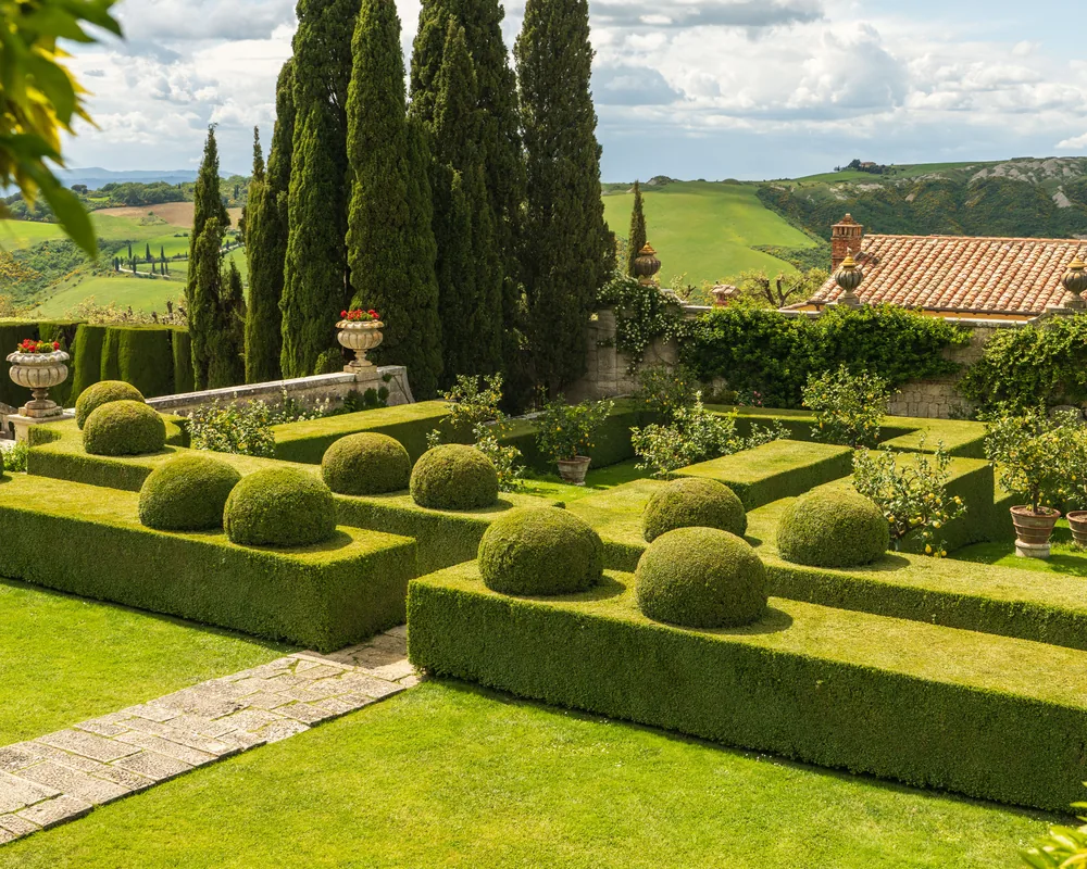 The same walled garden restored to a clipped formal parterre