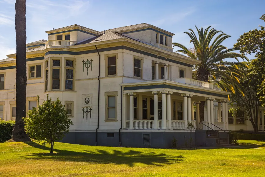 A columned house set in open parkland